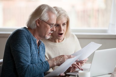 Getty Images Older couple shocked by a bill -- GettyImages