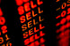A stock screen with sell in red several times.