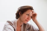 Getty - sad dismayed unhappy hand on head