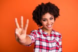 Getty - smiling three fingers three things
