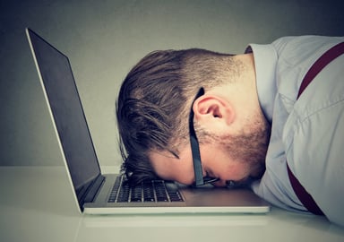 24_03_28 A person with their head down on a laptop computer _MF Dload _GettyImages-910148024-1137x800-18a52a2