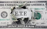 A dollar bill with ETF written behind it.