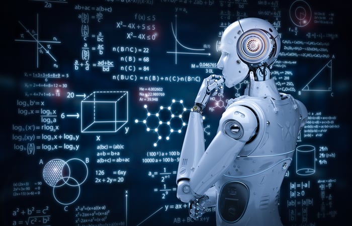 A robot is thinking in front of a chalkboard with complex formulas written on it.