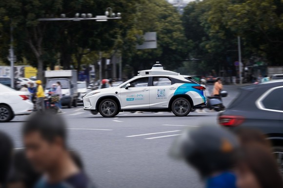A car driving in a city.