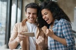 excited friends playing online games