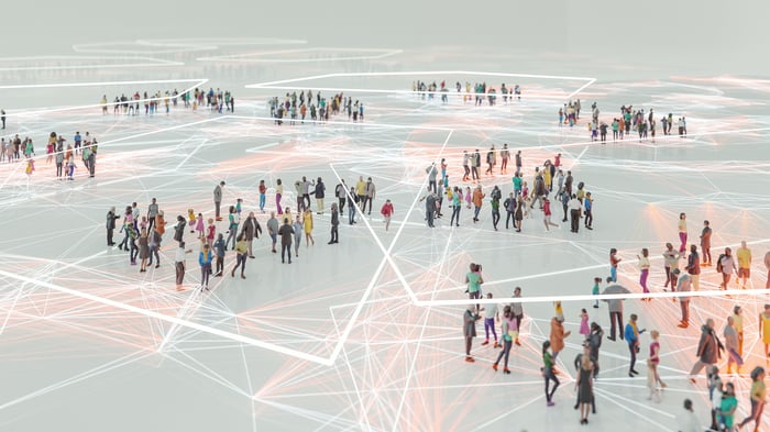Crowds of people connected by white lines.