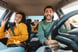 family in car