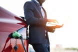 man charging electric vehicle EV-1200x800-5b2df79