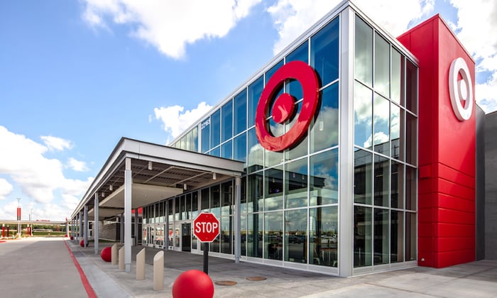The outside of a modern Target store on a cloudy day.