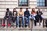 Students looking at their phones