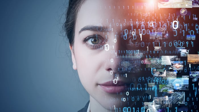 An image of a person overlaid by digital imagery.