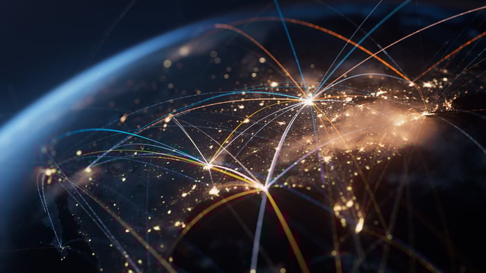 North America from space with lines connecting major cities.