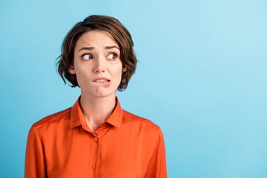 Getty - someone worried concerned thoughtful biting lip