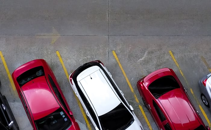 Cars in parking lot.