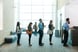 people standing in line bank teller