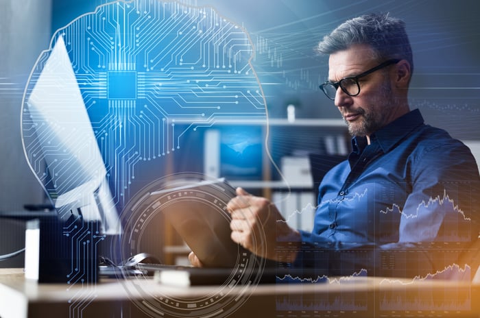 Investor reading on a computer.