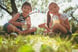 2 children drinking water