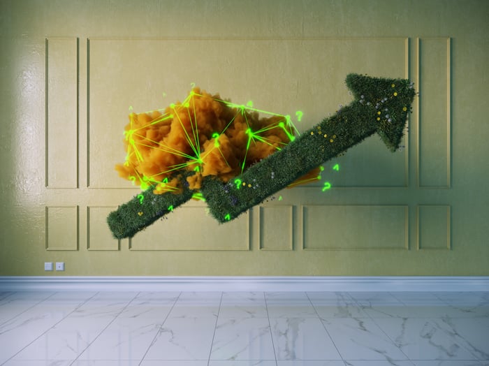 A green arrow rising out of an abstract representation of a cloud of brown smoke.