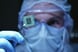 A person holding up an artificial intelligence chip