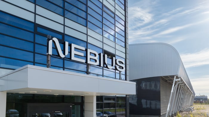 Nebius sign on large data center complex. 