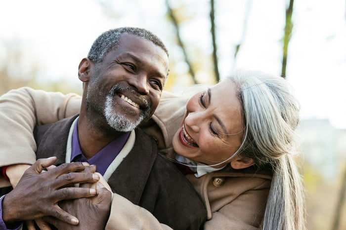 Older couple enjoying a day outdoors. 