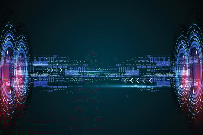 Artist's rendering of bits of data being sent between two lit transmitters.
