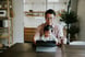 Father and child in front of a computer