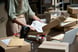 Person packing shipping boxes