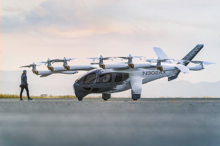 Archer's Midnight aircraft is pictured on a tarmac.