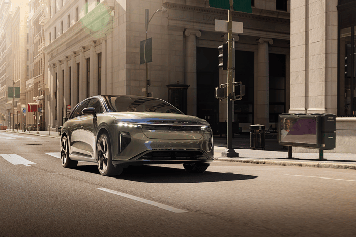 An SUV in a city.