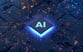 Semiconductor computer chip with the letters AI in the middle.
