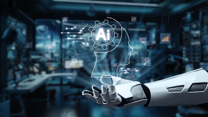 A robot hand under a graphic for AI.