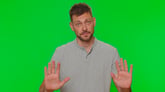 23_03_30 A person putting their hands up as if to say stop or slow down _MF Dload