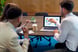 financial advisor laptop two people