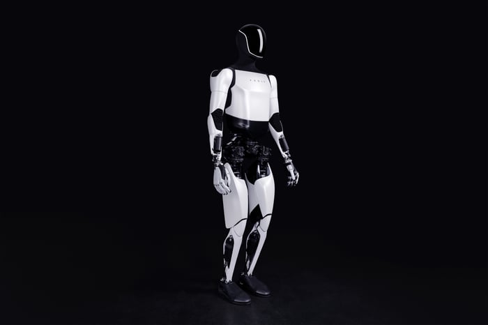 Tesla Optimus humanoid robot standing. 