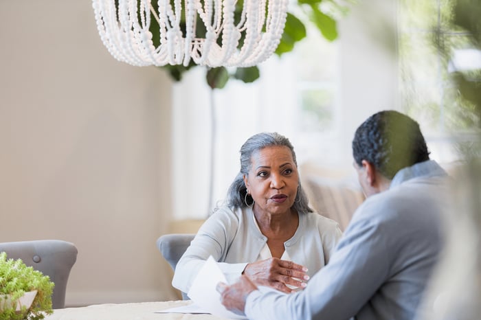 Two people at a table.