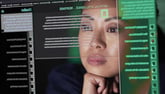 engineer looking at lines of code for artificial intelligence (AI)