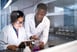 biotech pharma researchers talk lab