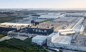 tesla gigafactory in shanghai with tesla logo