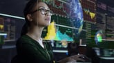 person analyzing data on a screen