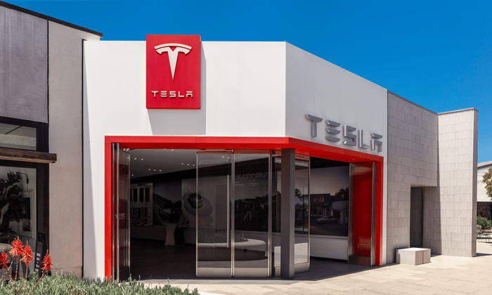 The exterior of a Tesla showroom.