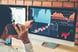 GettyImages-man pointing at screen charts phone