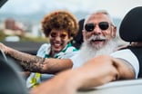 Getty - happy couple in car smiling