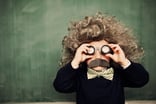 Child genius looking out