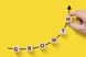 23_01_06 The word Growth spelled out with blocks aligned on an upward sloping line _MF Dload