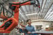 Warehouse robot with person in the background