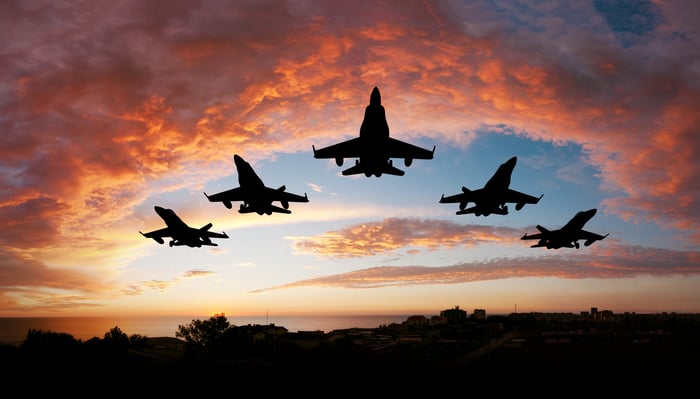 V formation of military airplanes.