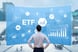 Person at board that says ETF (1)