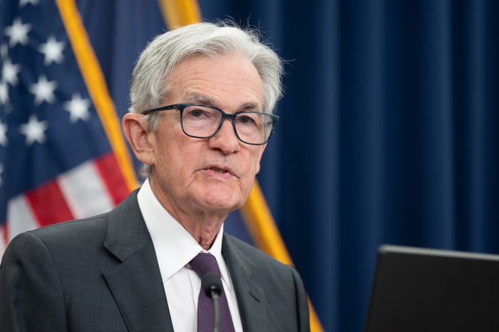 Jerome Powell fielding questions from reporters at a Federal Open Market Committee meeting.
