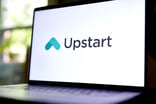 The Upstart logo displayed on a laptop screen
